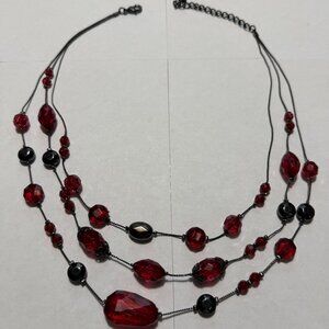 Necklace - Three strand black metal chain; Red and dark gray metallic beads